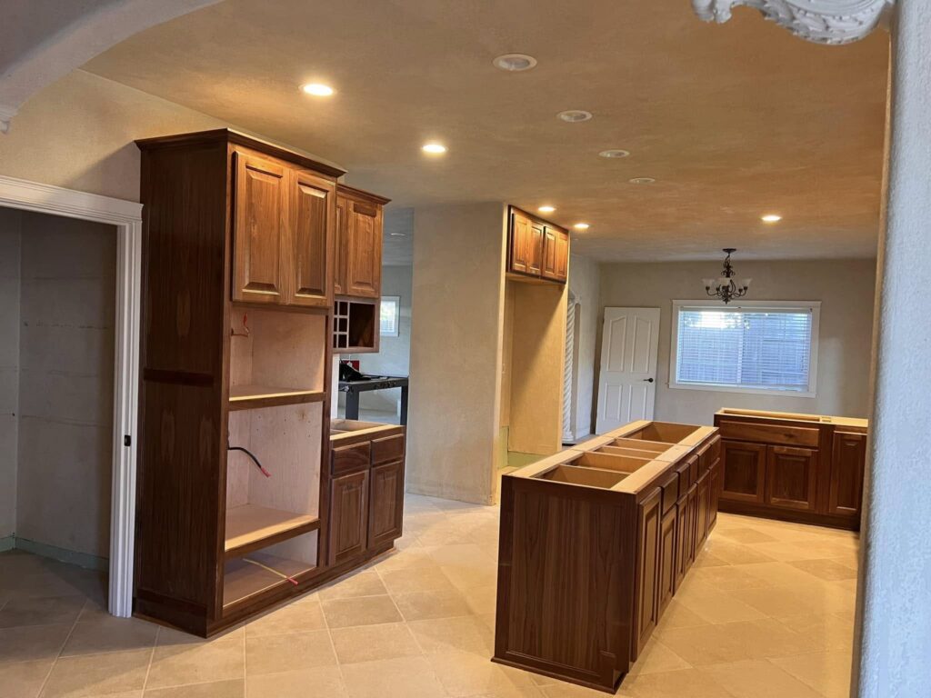 Walnut cabinets and island boxes viewed from the room entrance