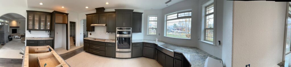Panoramic view of a kitchen cabinet installation