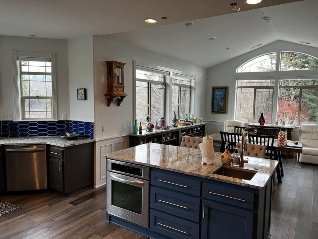 Completed blue-island kitchen viewed from the sink corner